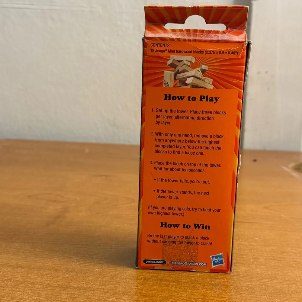 Hasbro Jenga Mini Game with‎ Red and Orange Packaging